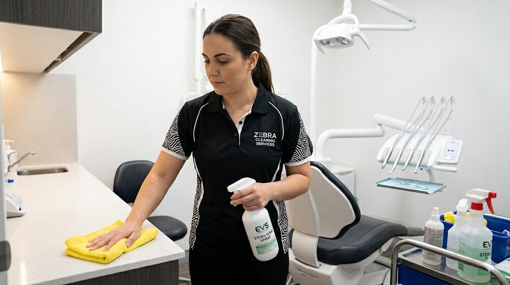 ZCCS certified EVS technician disinfecting dental operatory Grand Cayman
